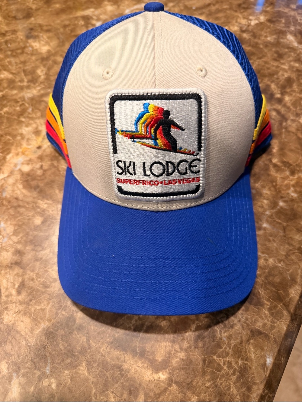 Ski Lodge Trucker Hat with Colorful Skier Patch - Blue & White